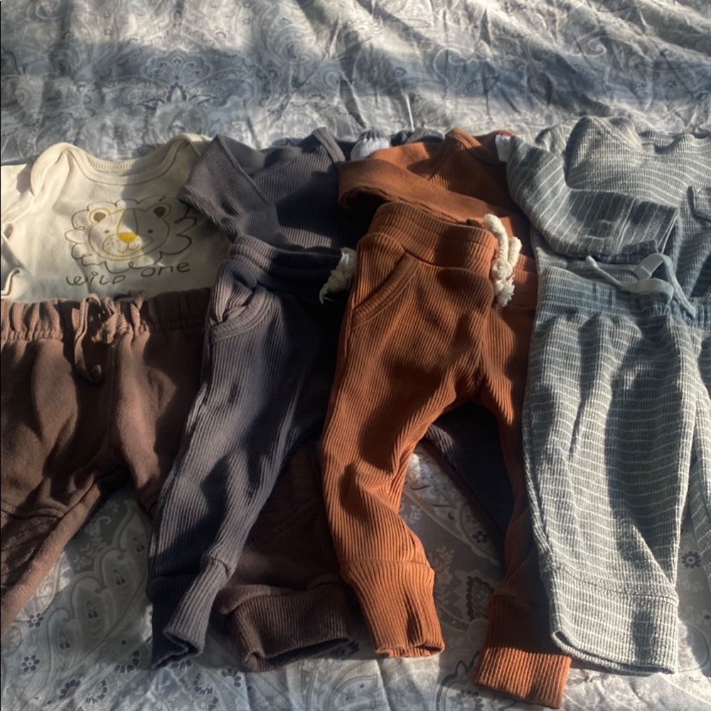 Lot of 4 sets of  boys 2 piece outfits . Old Navy, Carters and 2 are Mebie Baby